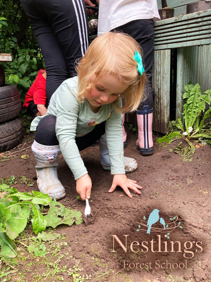 little girl digging