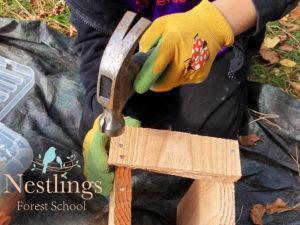 Woodwork boy hammering